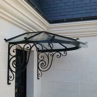 Auvent en fer forgé personnalisé avec fonctionnement fixe Anti-UV coupe-vent caractéristiques