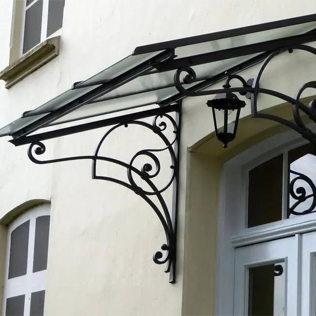 Auvent en fer forgé personnalisé avec fonctionnement fixe Anti-UV coupe-vent caractéristiques