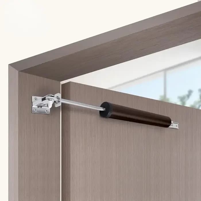 Fermeture en douceur automatique de la porte dans le positionnement