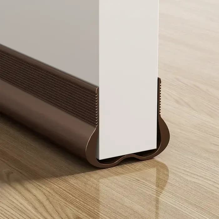 Bande d'étanchéité souple en PVC pour bas de porte